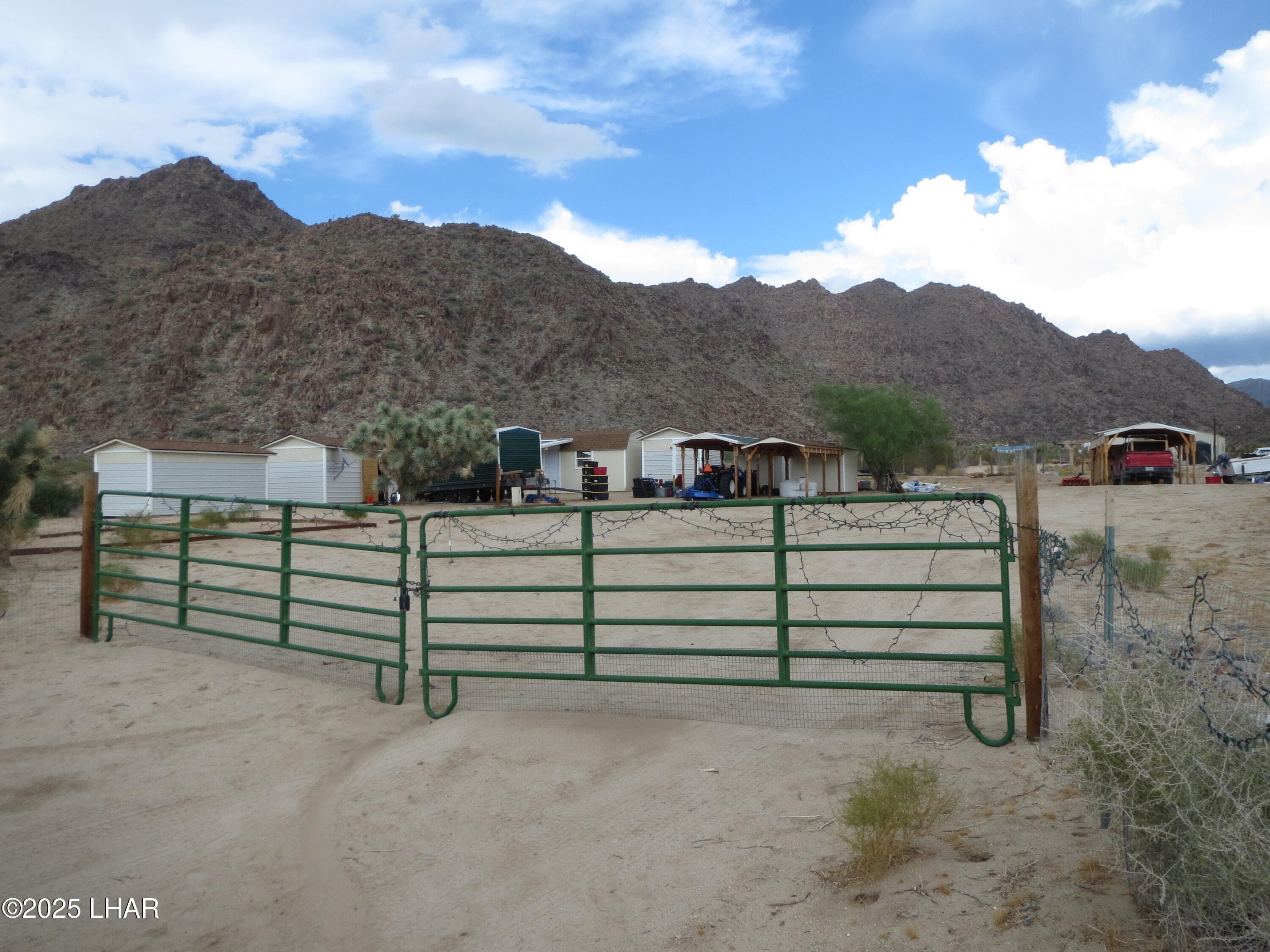 11964 Nolan Road Yucca, AZ 86438 - Photo 1 of 29 Front gate to Property
