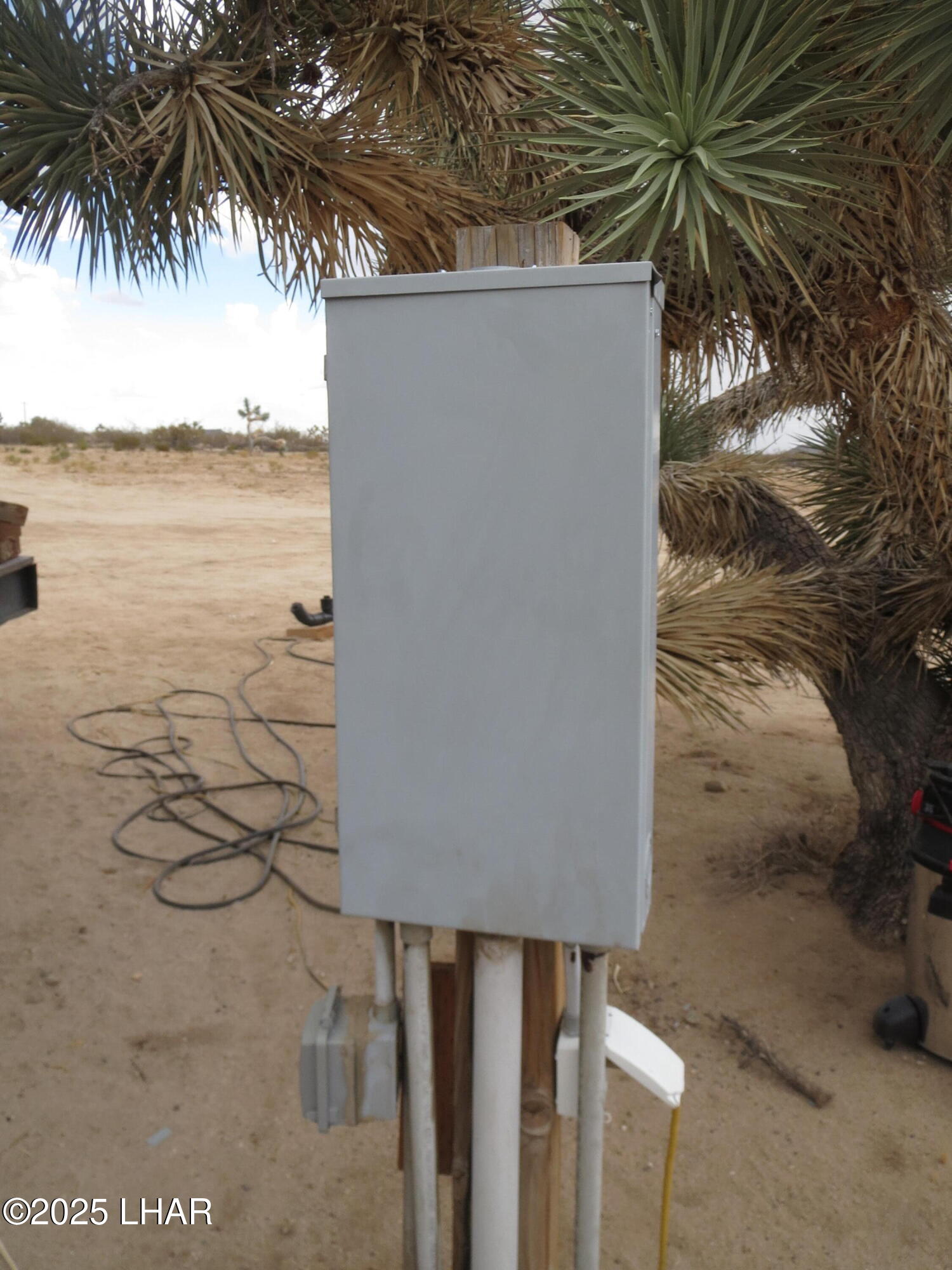 11964 Nolan Road Yucca, AZ 86438 - Photo 23 of 29 Electrical Panel at RV Hook up Station