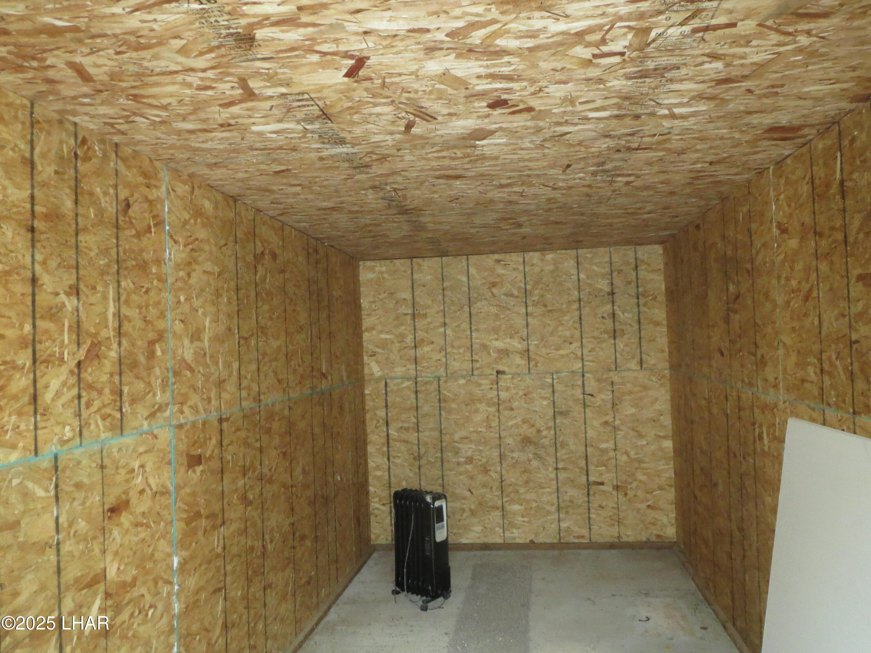11964 Nolan Road Yucca, AZ 86438 - Photo 25 of 29 Interior of 8 ft X 18 Ft of #2 Storage Building on Concrete Foundation