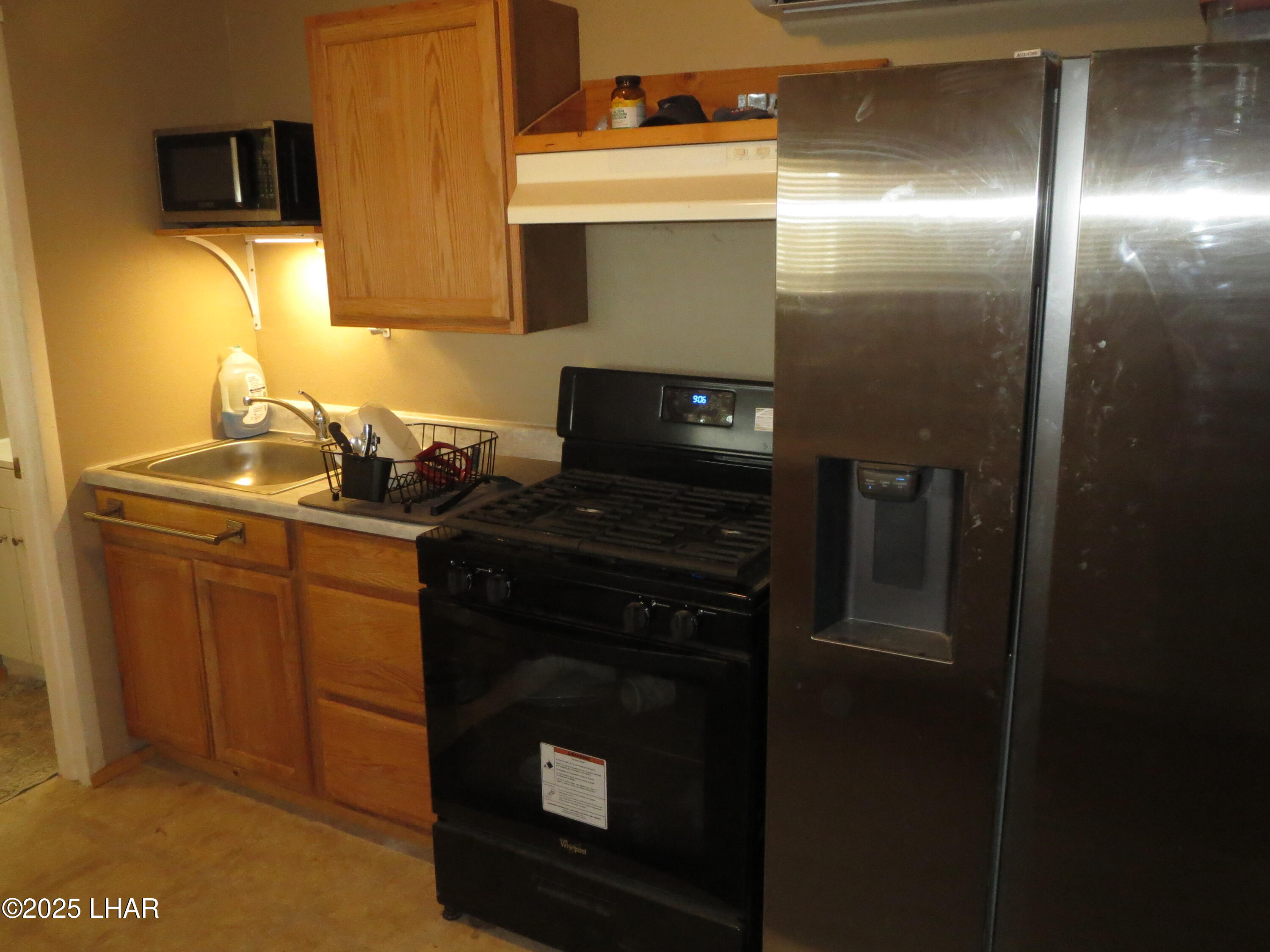 11964 Nolan Road Yucca, AZ 86438 - Photo 10 of 29 Kitchen with Propane Stove