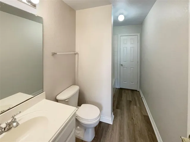 a bathroom with a tub a sink and shower
