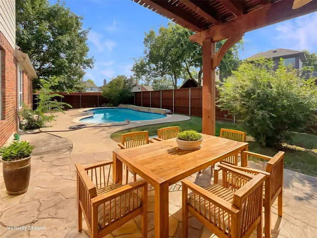 a bathroom with a double vanity sink and mirror