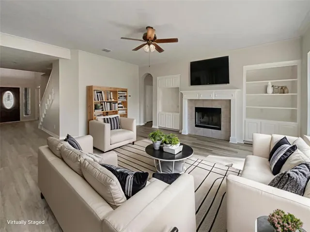 a kitchen with stainless steel appliances granite countertop a stove and a wooden cabinets
