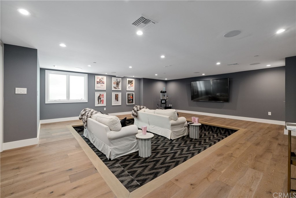 3808 The Strand Manhattan Beach, CA 90266 - Photo 19 of 67 Fully equipped in-home movie theatre/media room with sunken living room feature.