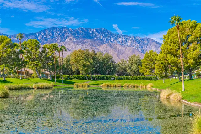 a view of a lake with a big yard