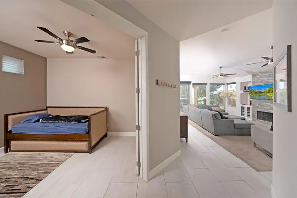 a living room with furniture and a rug