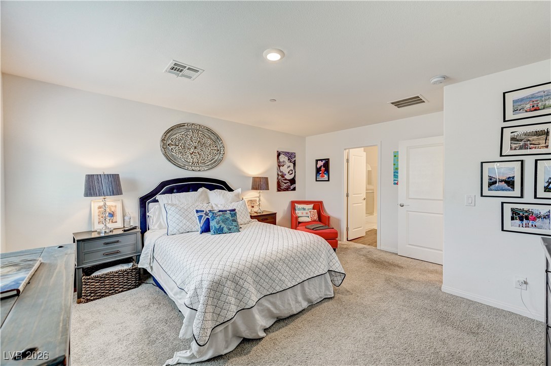 12183 Mojave Gold Road, Unit 2 Las Vegas, NV 89183 - Photo 15 of 42 Primary bedroom with en suite bath