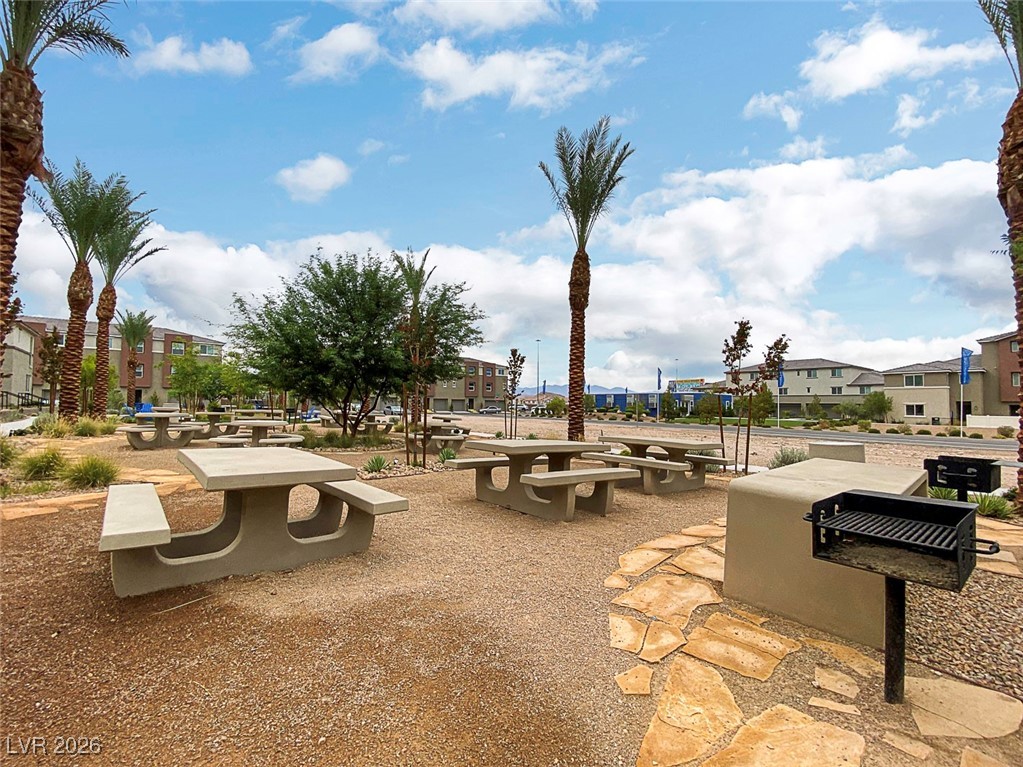 12183 Mojave Gold Road, Unit 2 Las Vegas, NV 89183 - Photo 39 of 42 Open air tables and grill area