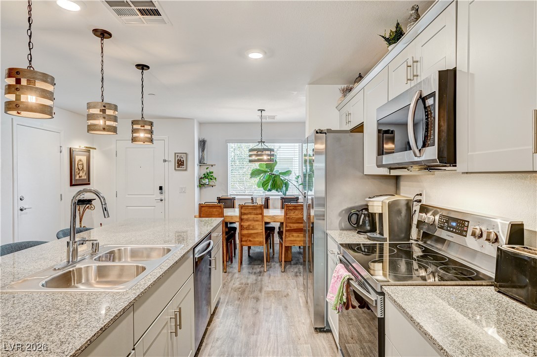 12183 Mojave Gold Road, Unit 2 Las Vegas, NV 89183 - Photo 6 of 42 Stainless steel kitchen appliances