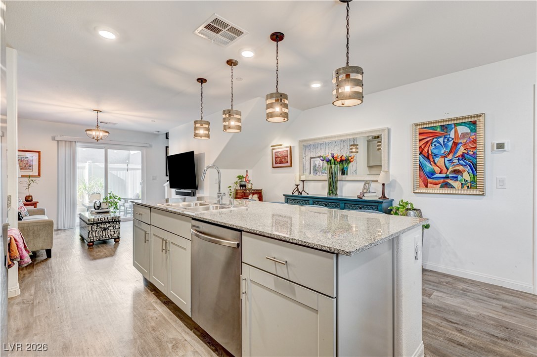 12183 Mojave Gold Road, Unit 2 Las Vegas, NV 89183 - Photo 7 of 42 Kitchen view into living room area