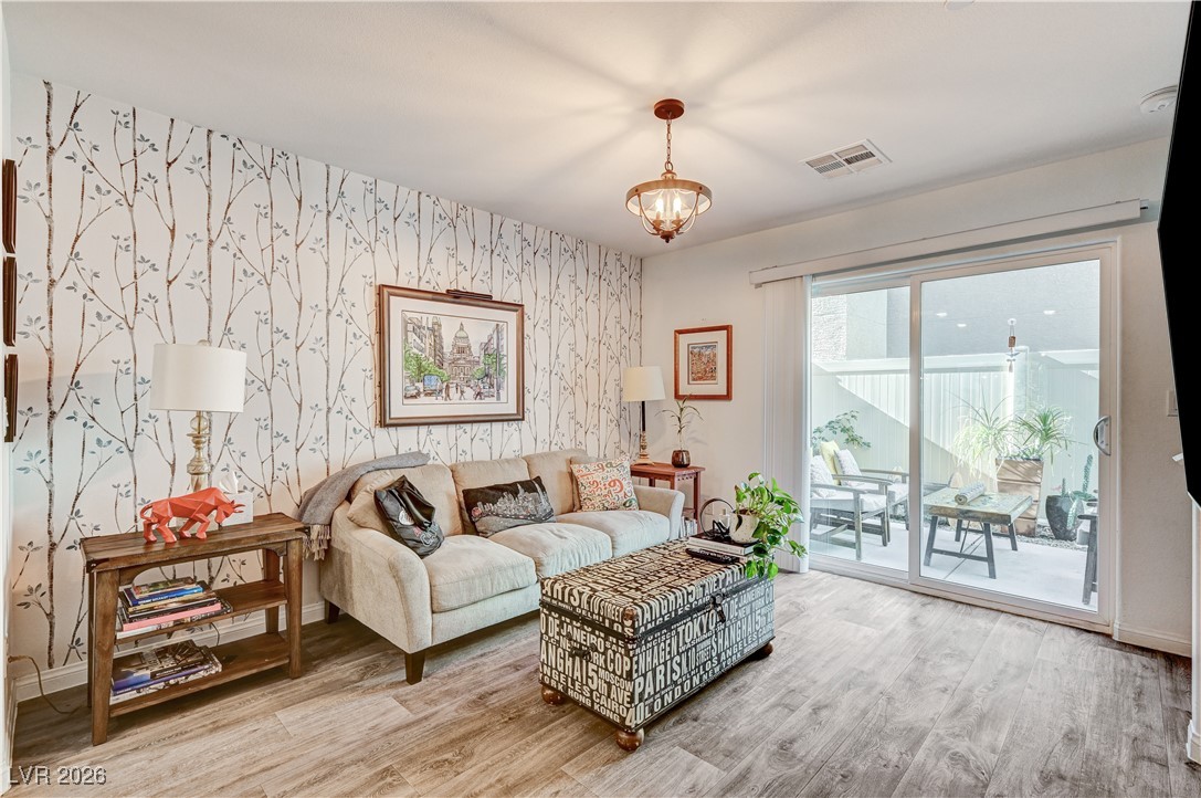 12183 Mojave Gold Road, Unit 2 Las Vegas, NV 89183 - Photo 8 of 42 Living room with slider to backyard and patio