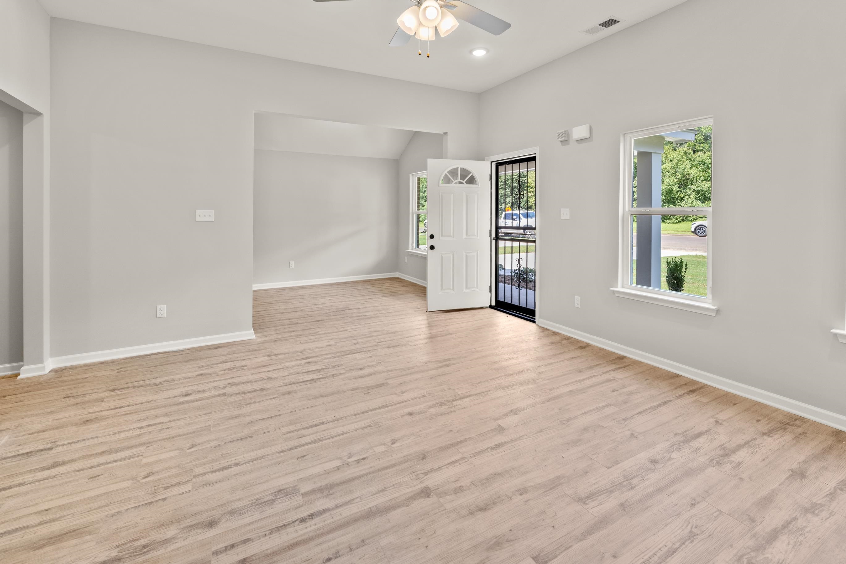 5273 Zodiac Road Memphis, TN 38118 - Photo 4 of 9 living room featuring light wood-style flooring, recessed lighting, and a ceiling fan