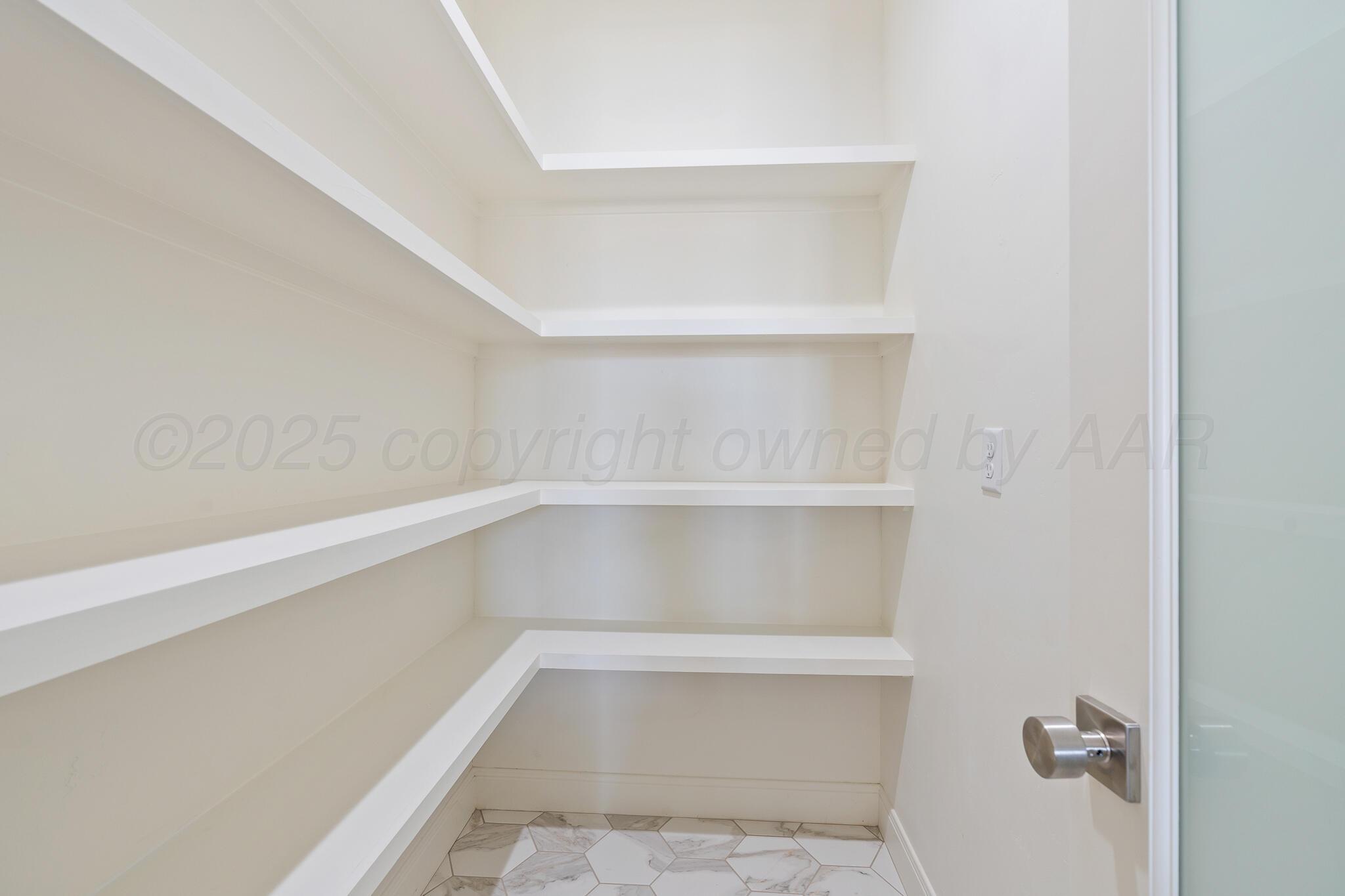 3551 Whitetail Springs Road Amarillo, TX 79119 - Photo 17 of 33 a view of an empty walk in closet