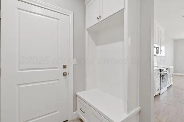 an empty room with cabinet