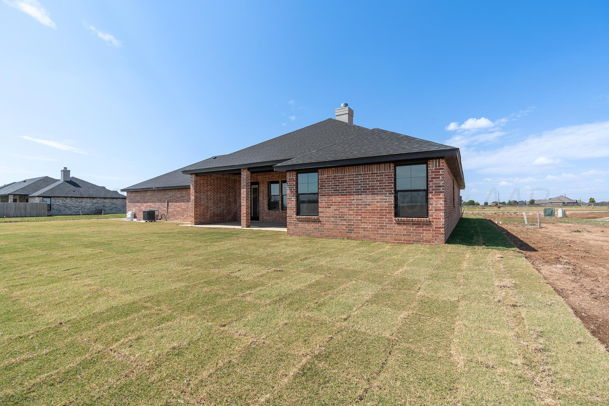 3551 Whitetail Springs Road Amarillo, TX 79119 - Photo 5 of 33 a front view of a house with yard
