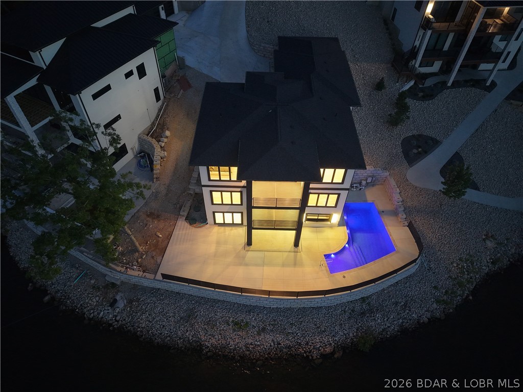 439 Red Bud Road Lake Ozark, MO 65049 - Photo 85 of 98 Dramatic twilight aerial providing a breathtaking