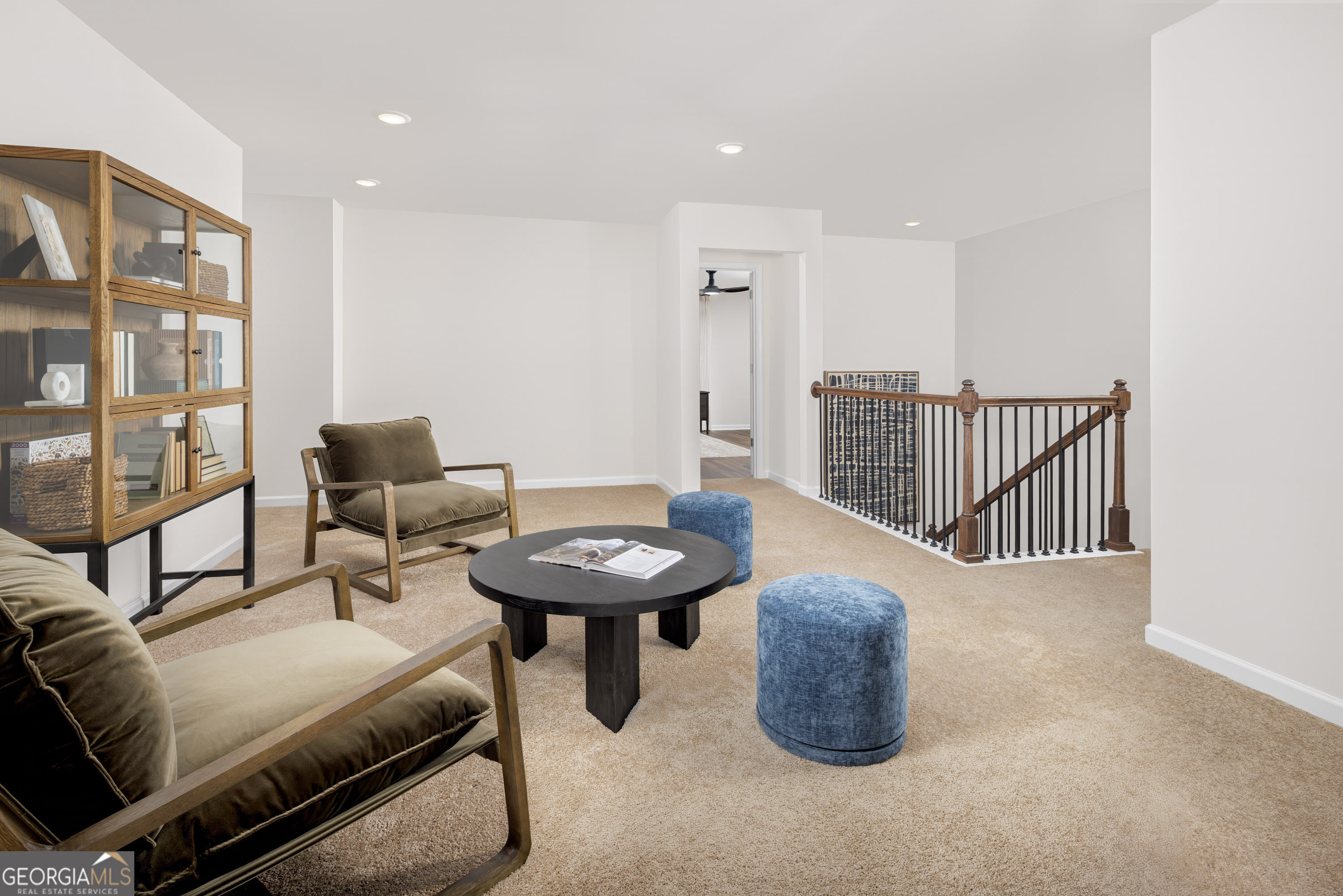 129 Southeast Honey Creek Road, Unit 4 Conyers, GA 30094 - Photo 7 of 21 a living room with furniture