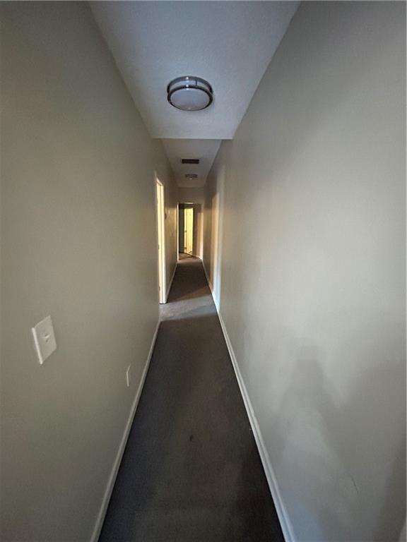 1182 Sims Street Southwest Atlanta, GA 30310 - Photo 13 of 35 a view of a hallway with wooden floor