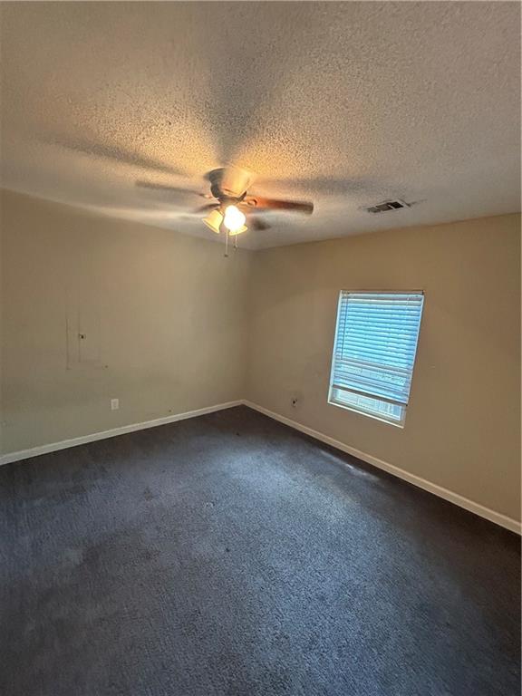 1182 Sims Street Southwest Atlanta, GA 30310 - Photo 14 of 35 a view of an empty room with a window