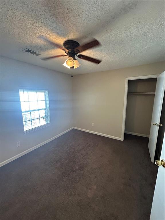 1182 Sims Street Southwest Atlanta, GA 30310 - Photo 34 of 35 an empty room with a window and a fan