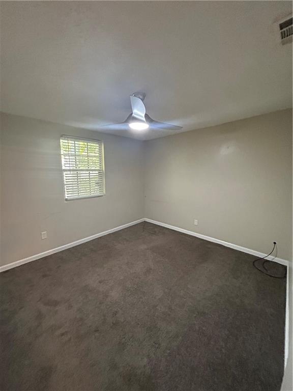 1182 Sims Street Southwest Atlanta, GA 30310 - Photo 35 of 35 an empty room with a window