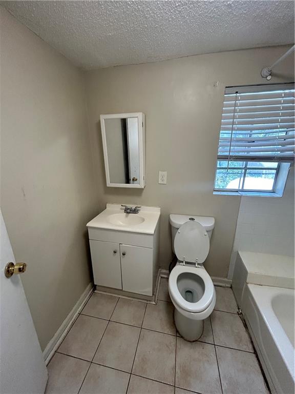 1182 Sims Street Southwest Atlanta, GA 30310 - Photo 9 of 35 a bathroom with a toilet sink and mirror