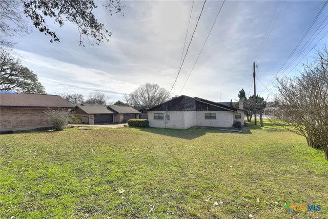 a swimming pool with yard