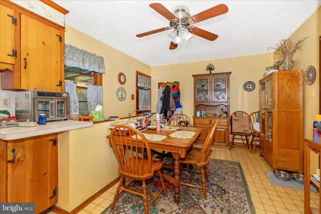 a kitchen with stainless steel appliances a sink and cabinets
