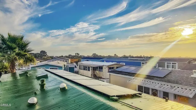 an aerial view of residential houses and outdoor space