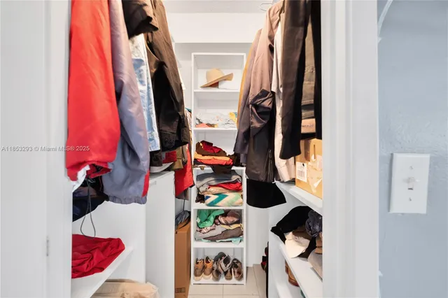 wooden floor with lots of different colored cloths