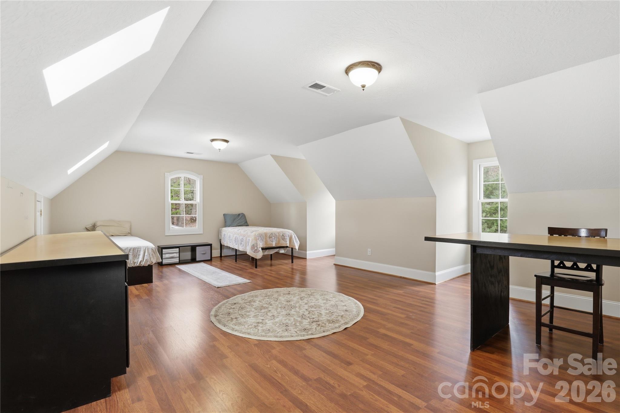 1084 Rocky Headwaters Road Moravian Falls, NC 28654 - Photo 23 of 43 a living room with furniture and wooden floor