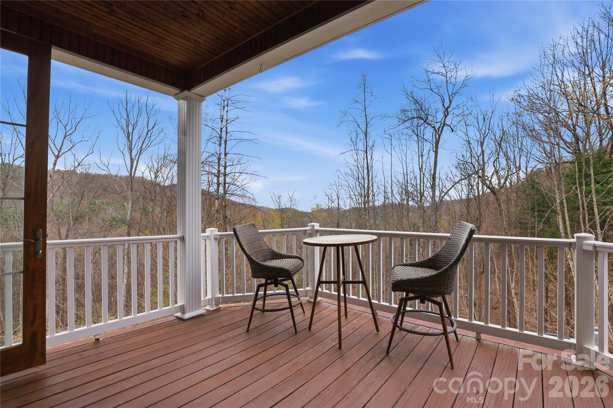 1084 Rocky Headwaters Road Moravian Falls, NC 28654 - Photo 35 of 43 a view of balcony with furniture and wooden floor