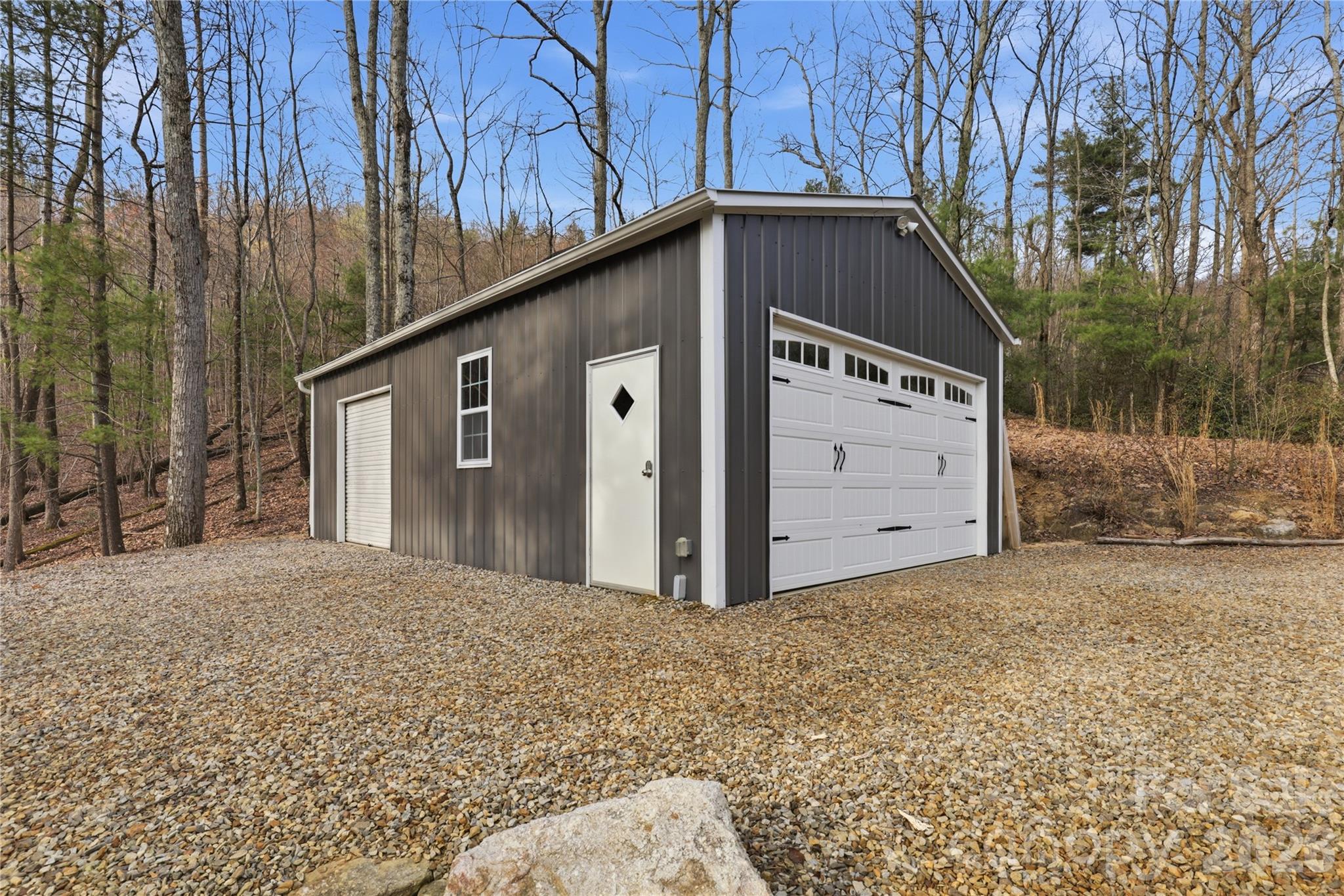 1084 Rocky Headwaters Road Moravian Falls, NC 28654 - Photo 39 of 43 a view of a house with a yard