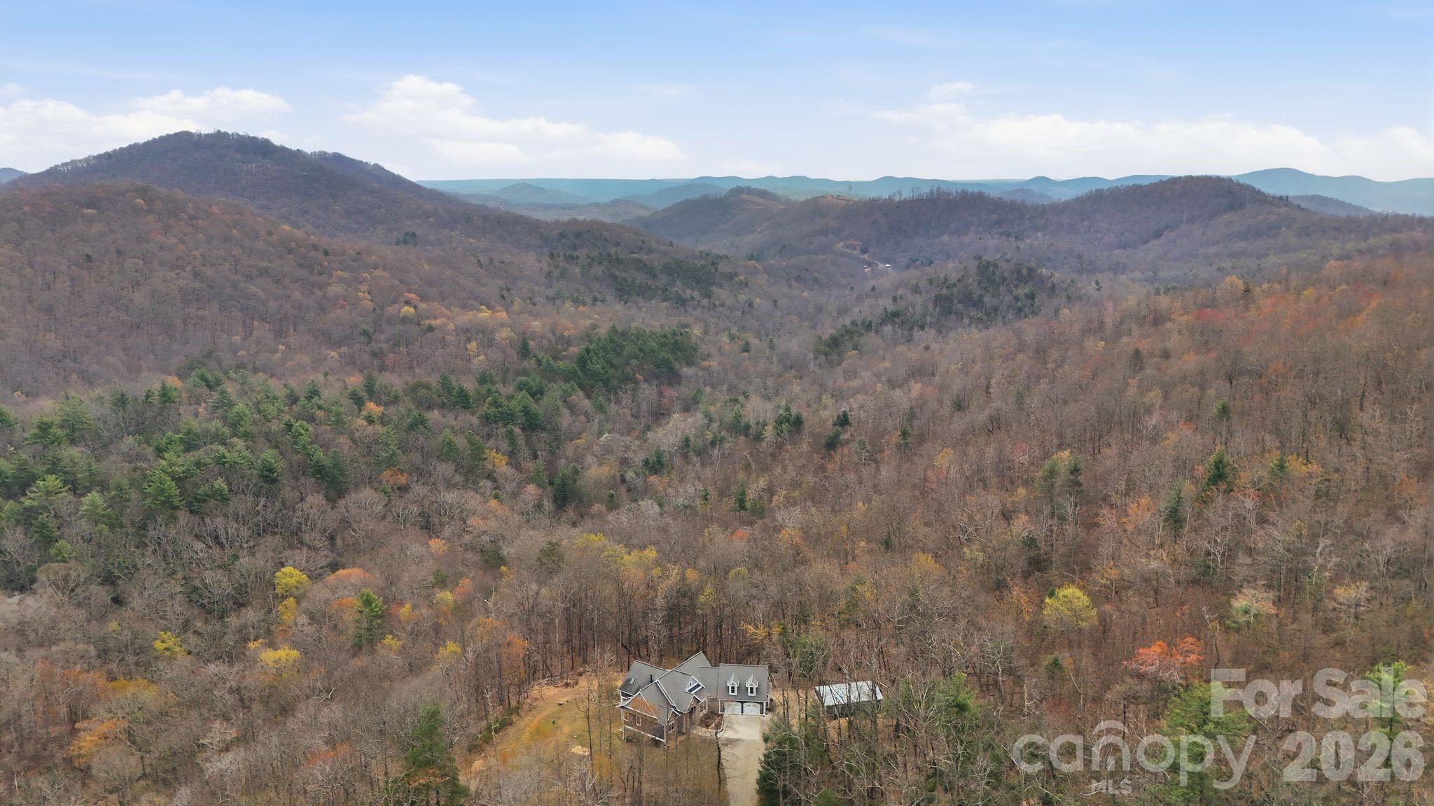 1084 Rocky Headwaters Road Moravian Falls, NC 28654 - Photo 43 of 43 a view of a mountain range with trees in the background
