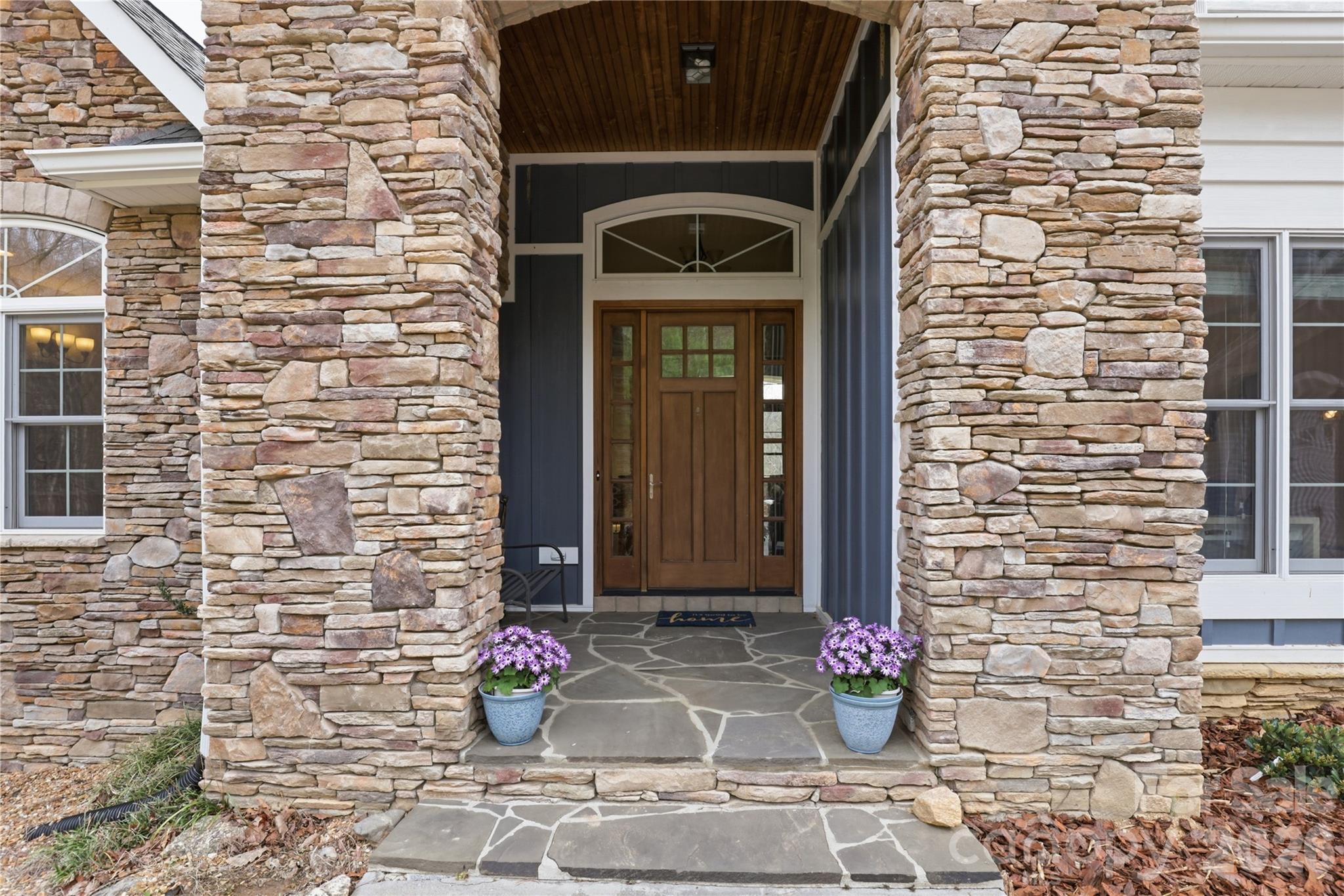 1084 Rocky Headwaters Road Moravian Falls, NC 28654 - Photo 5 of 43 a front view of a house with outdoor space