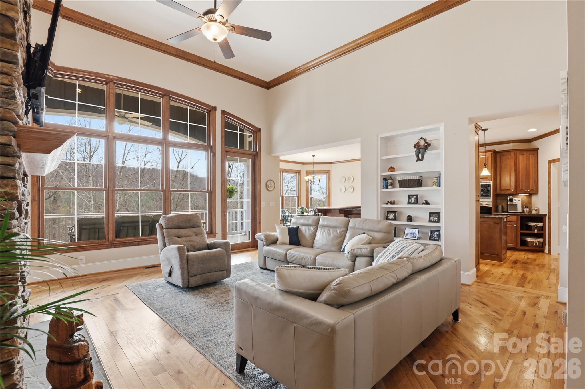 1084 Rocky Headwaters Road Moravian Falls, NC 28654 - Photo 7 of 43 a living room with furniture and a large window