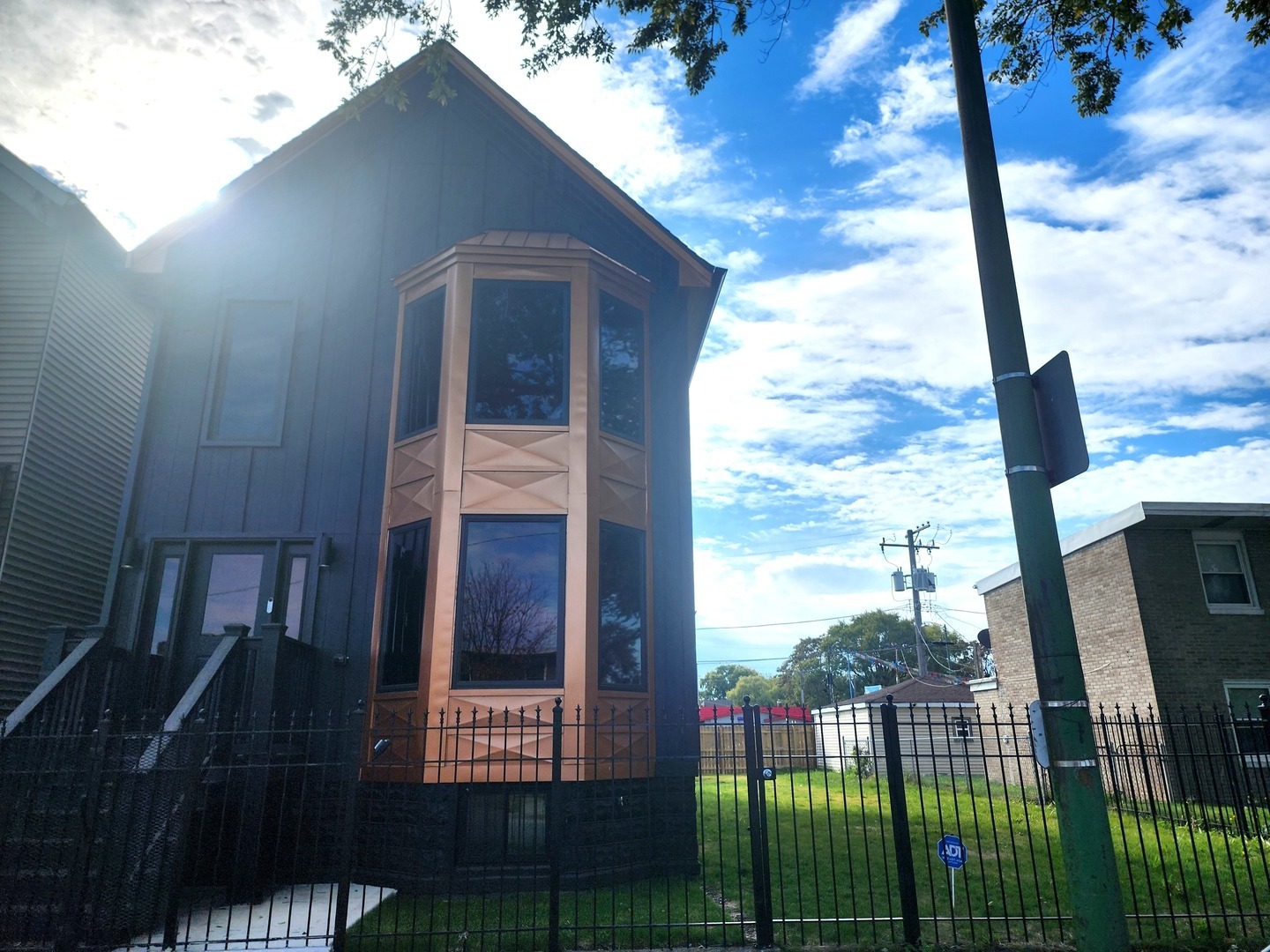 243 West Swann Street, Unit 2 Chicago, IL 60609 - Photo 1 of 10 a view of a porch with a floor to ceiling window
