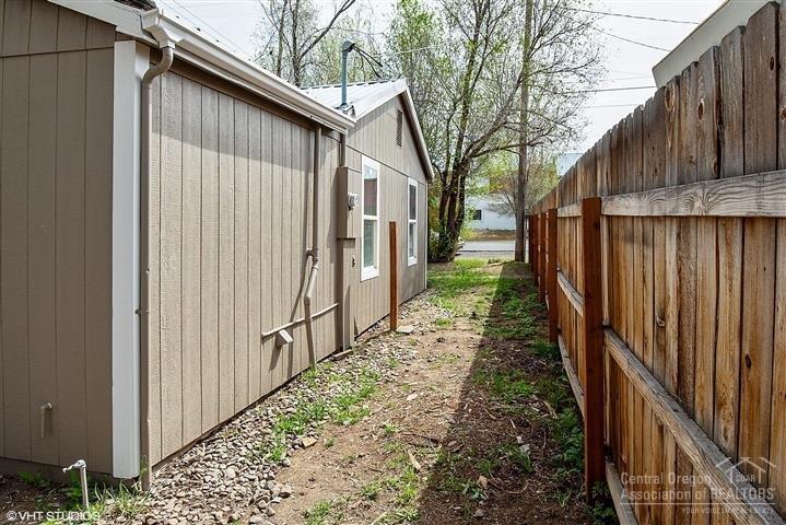756 Southwest 3rd Street Madras, OR 97741 - Photo 23 of 24 Left side of home with newer fence