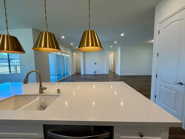 a view of a sink and an entryway