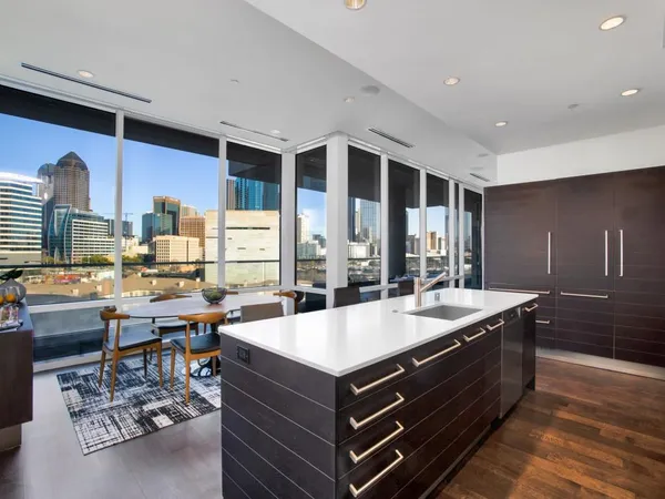 a room with a large window and table