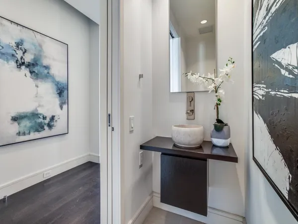 a view of a living room and kitchen with furniture