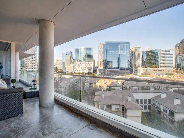 a view of swimming pool with outdoor seating