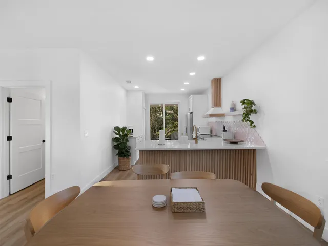 a workspace with furniture and wooden floor