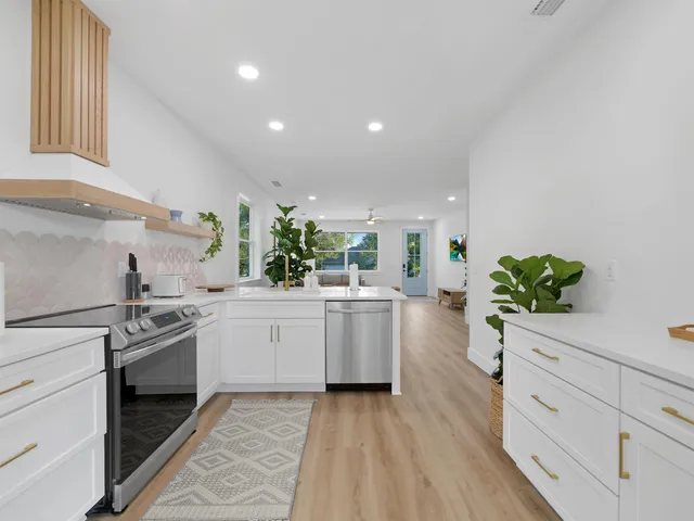 a bedroom with a bed and a television