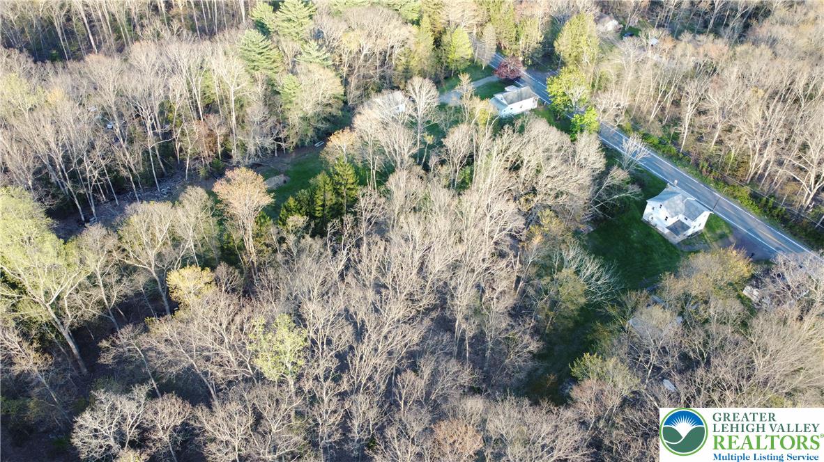 5444 Quakake Road Weatherly, PA 18255 - Photo 16 of 21 This elevated view captures the expansive landscape surrounding a charming home.