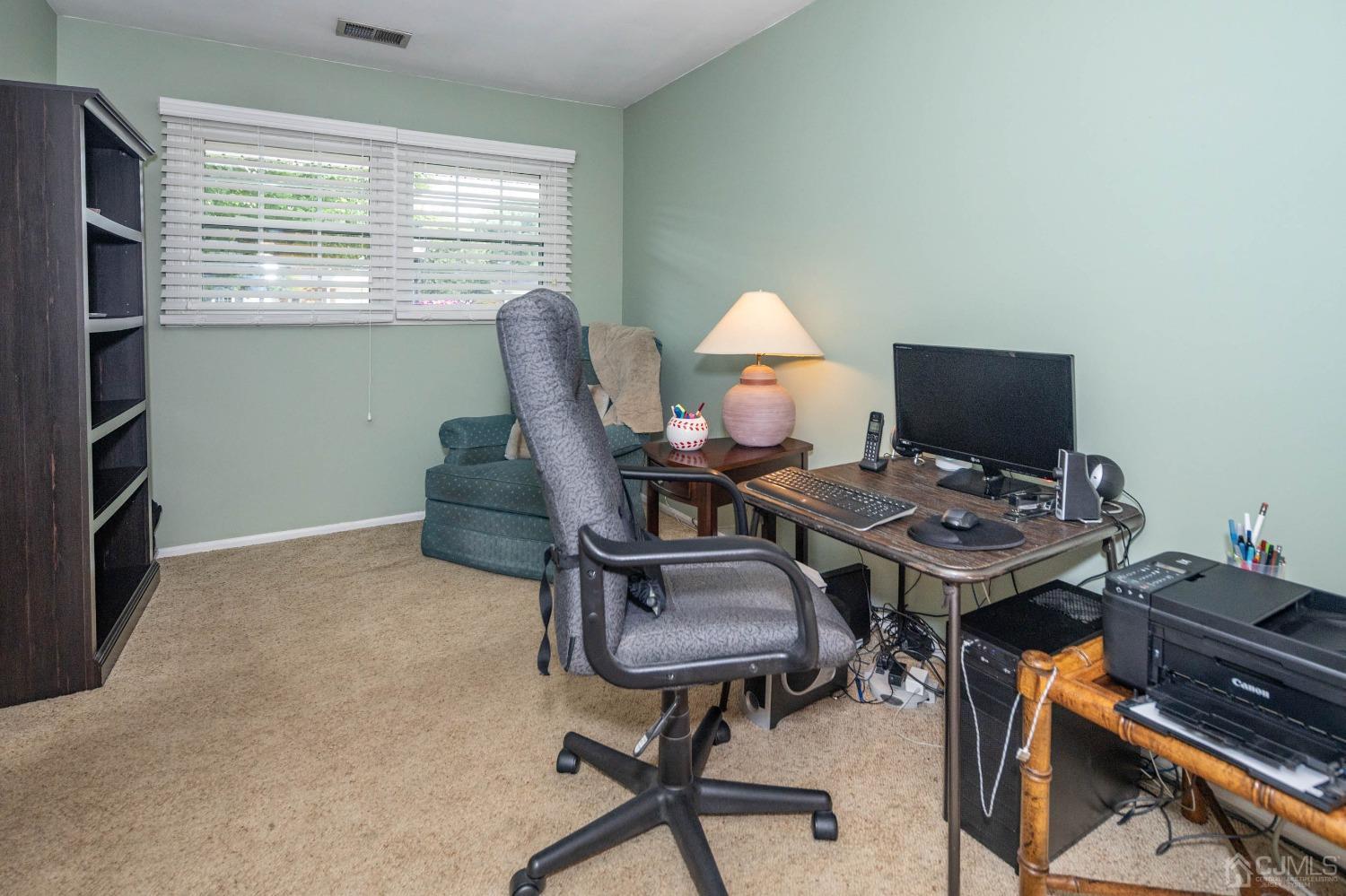 4 Overview Court Edison, NJ 08817 - Photo 27 of 44 a view of a workspace with furniture