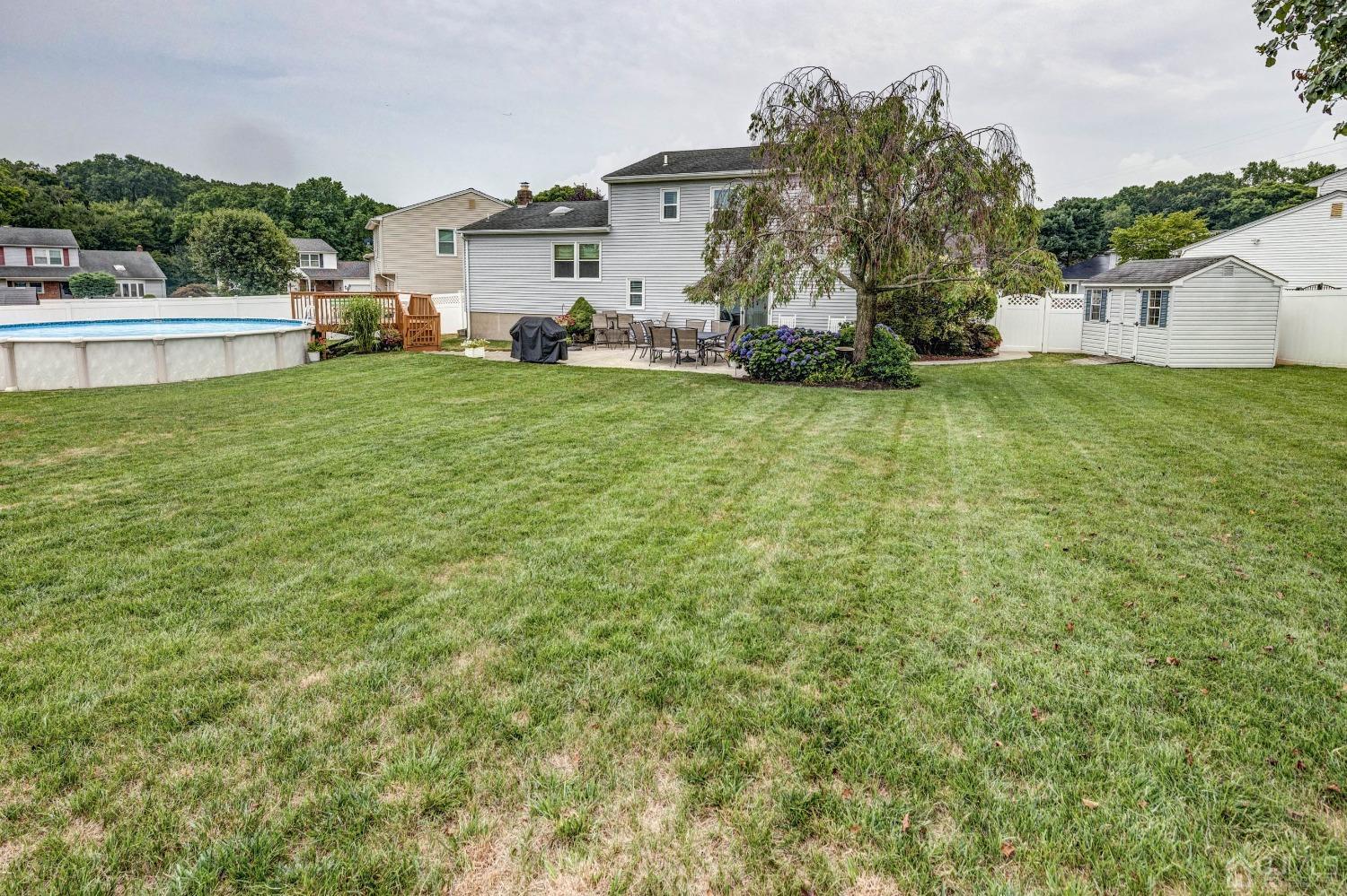 4 Overview Court Edison, NJ 08817 - Photo 33 of 44 a view of a house with a yard and sitting area