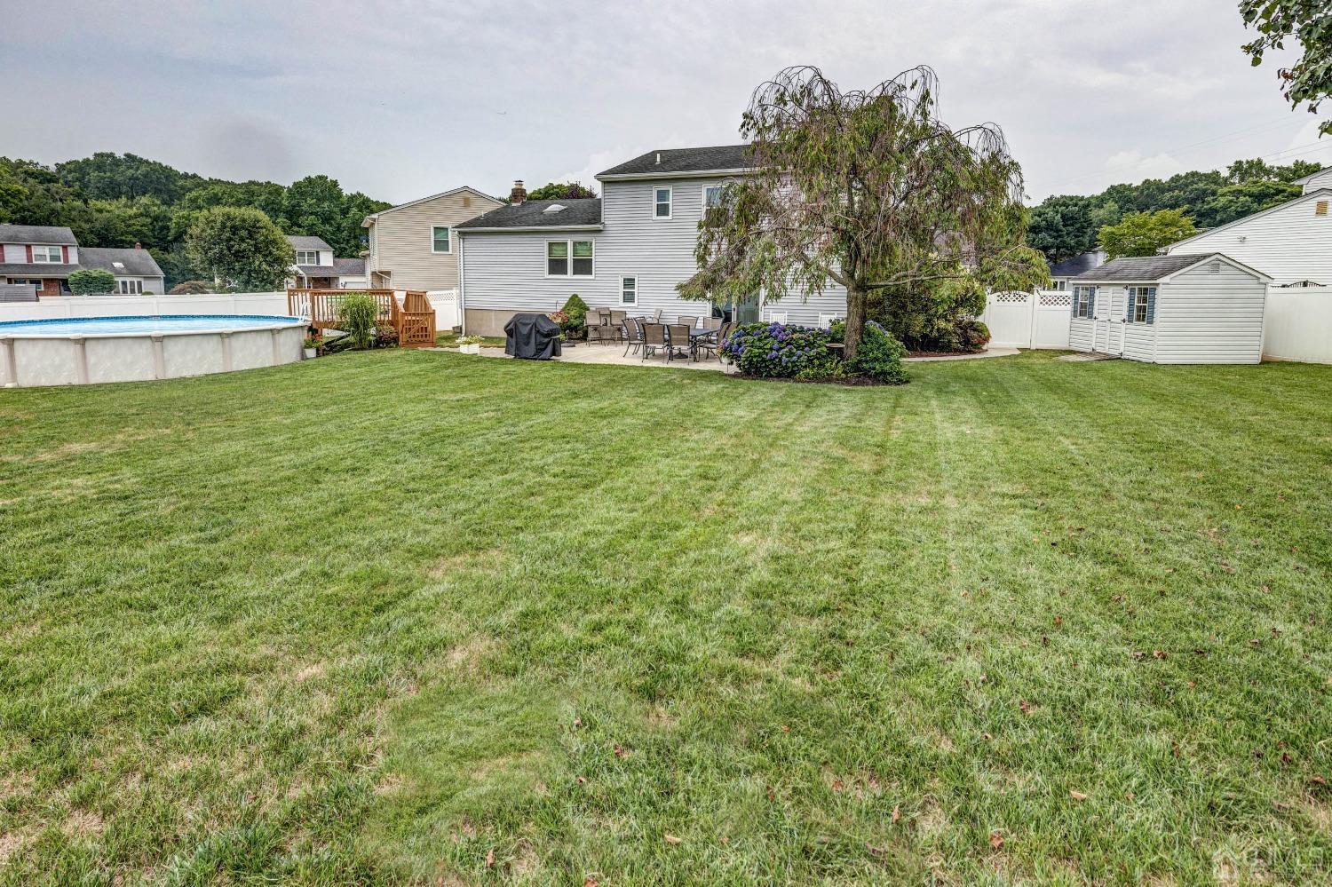 4 Overview Court Edison, NJ 08817 - Photo 38 of 44 a view of a house with a yard and sitting area