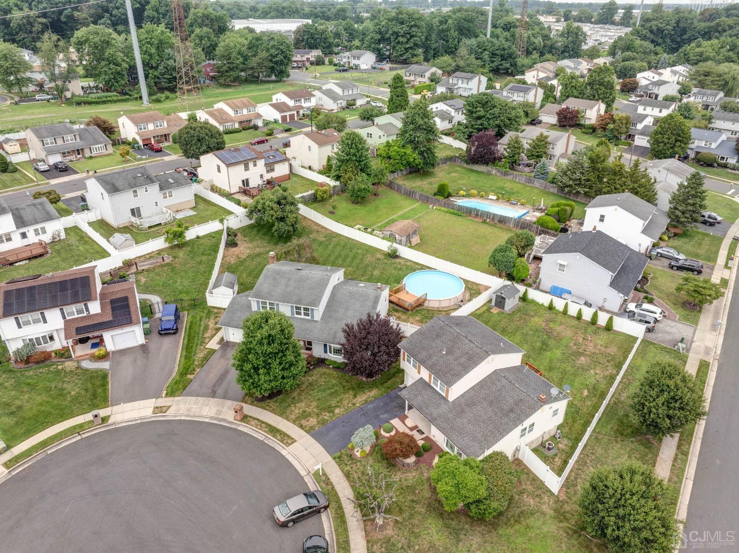 4 Overview Court Edison, NJ 08817 - Photo 41 of 44 an aerial view of residential houses with outdoor space and street view