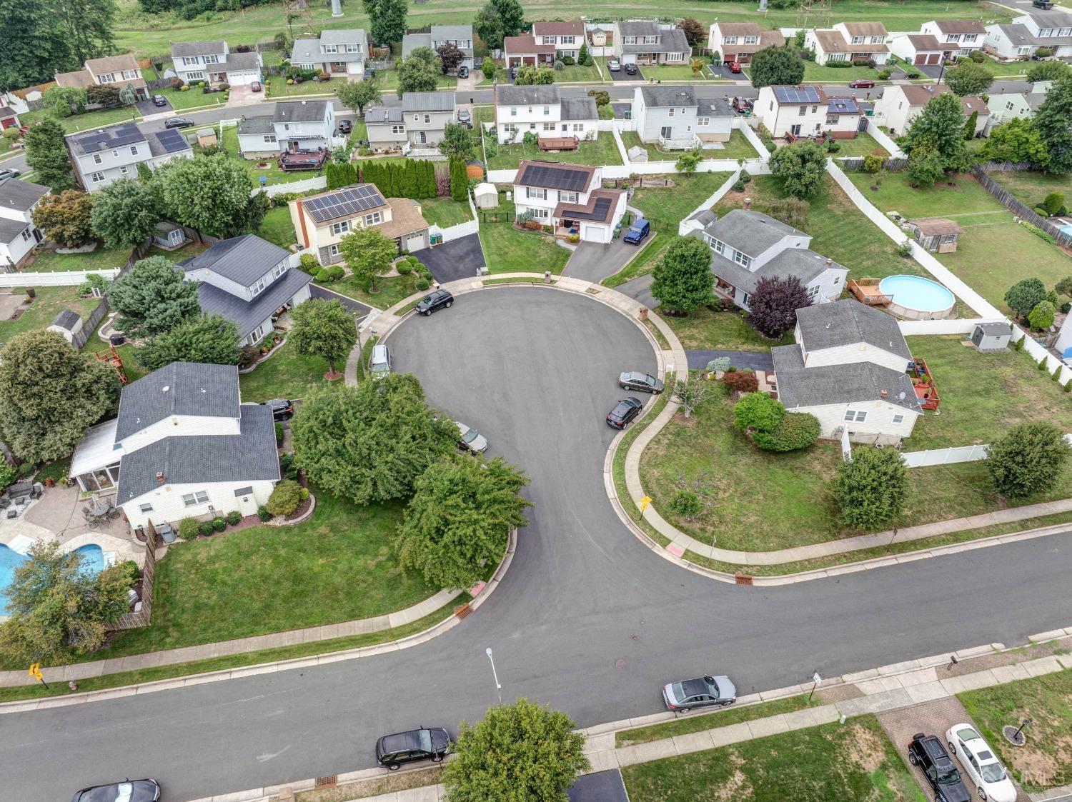4 Overview Court Edison, NJ 08817 - Photo 42 of 44 an aerial view of residential house with outdoor space and street view
